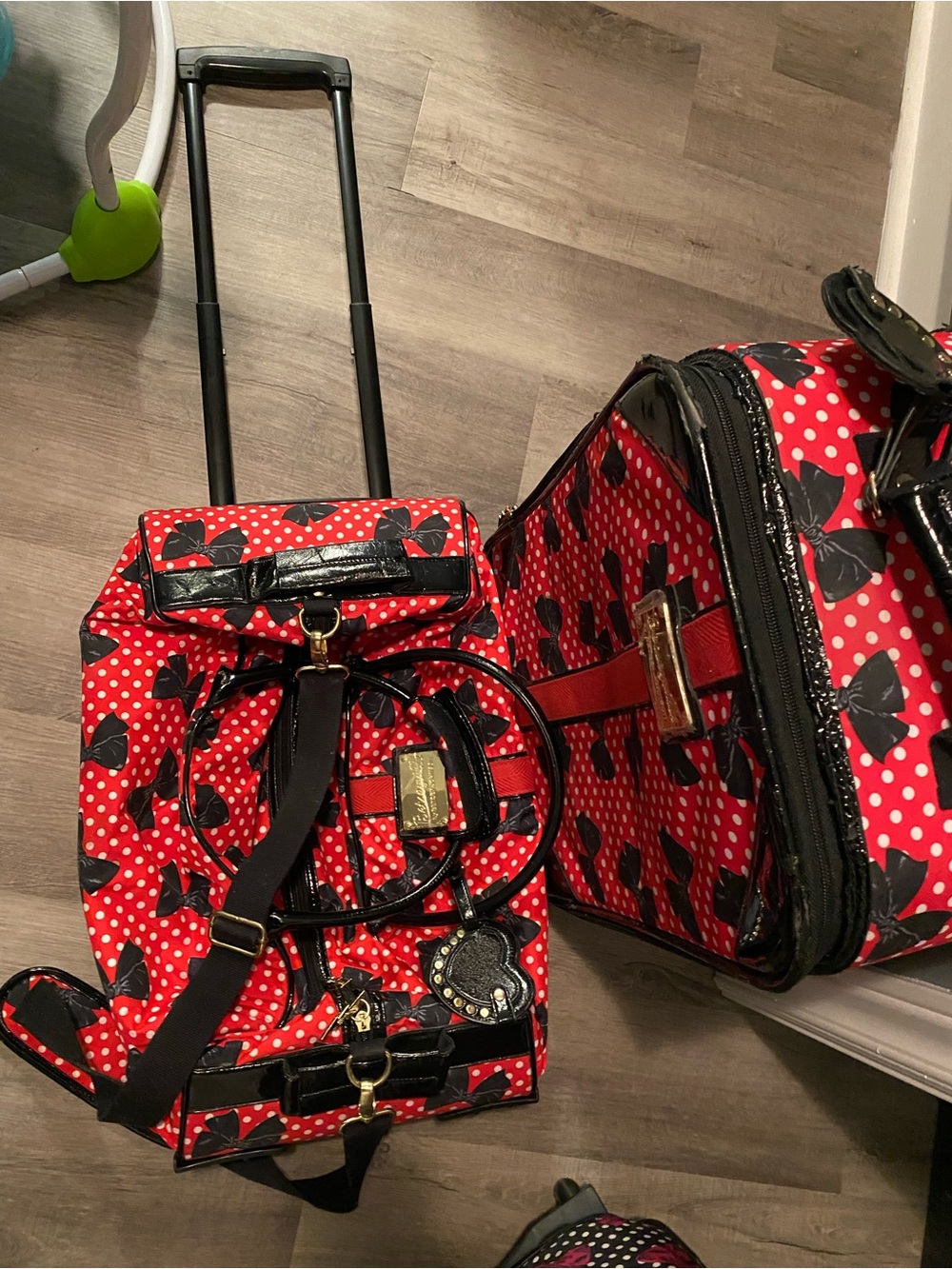 Betsey Johnson Red Polka Dot Rolling Travel Bag with Black Bow Accents
